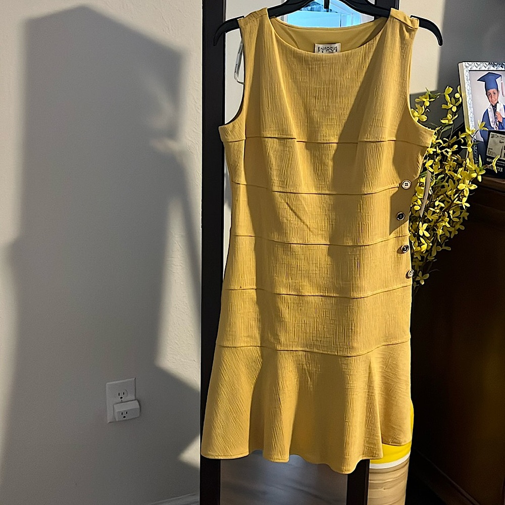 Dress mustard color little skirt on bottom